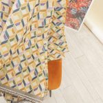 Buy Gobelin fabric with yellow, olive green and blue three-dimensional cube pattern on a beige ground (280x270 cm) at Deco Italian Design. Geometric design and high quality.