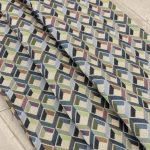 Buy Gobelin fabric patterned three-dimensional cubes blue, sage green and charcoal gray on a beige ground (280x270 cm) at Deco Italian Design. Modern design and premium quality.