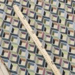 Buy Gobelin fabric patterned three-dimensional cubes blue, sage green and charcoal gray on a beige ground (280x270 cm) at Deco Italian Design. Modern design and premium quality.